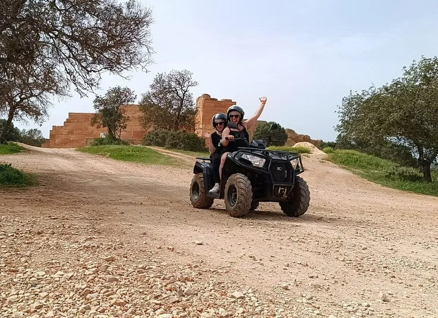 Group following the guide on the 1.5-hour quad bike tour